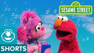 Sesame Street Elmo Teaches Abby How to Blow Bubbles [upl. by Nedac]